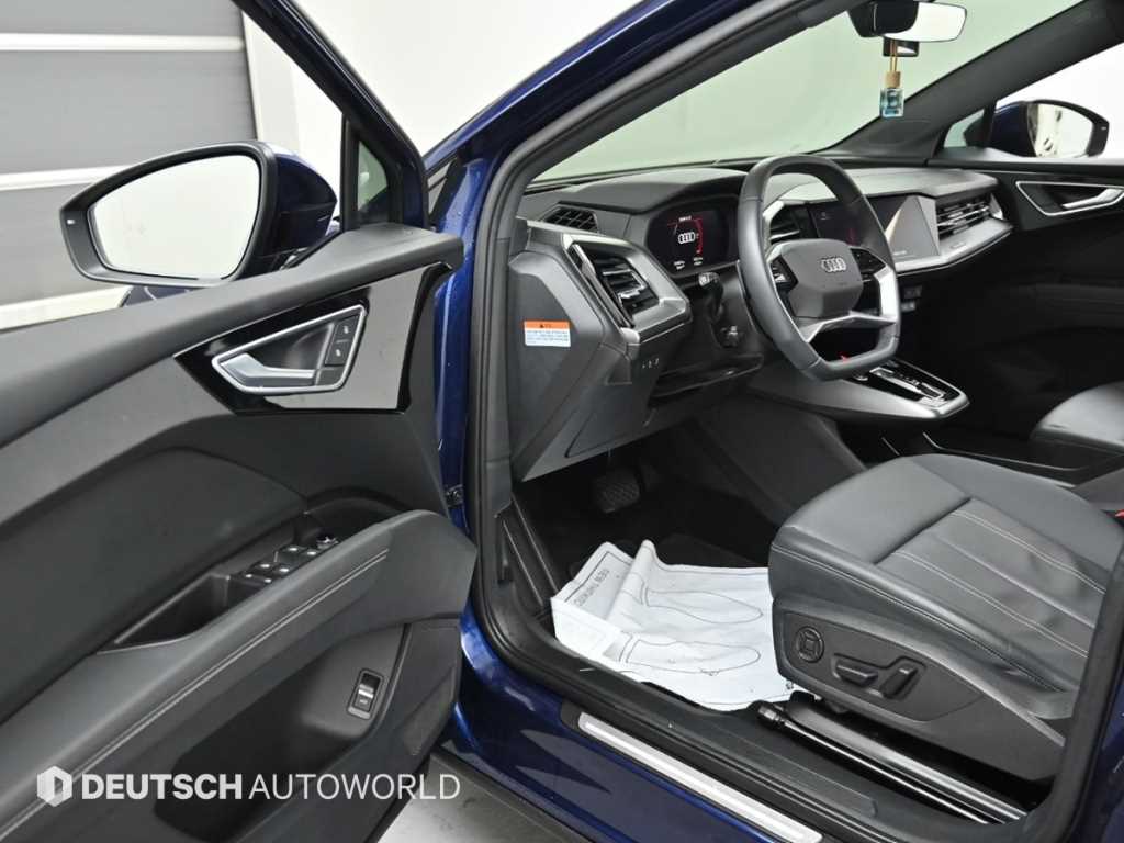 Audi Q4 e-tron — photo 11