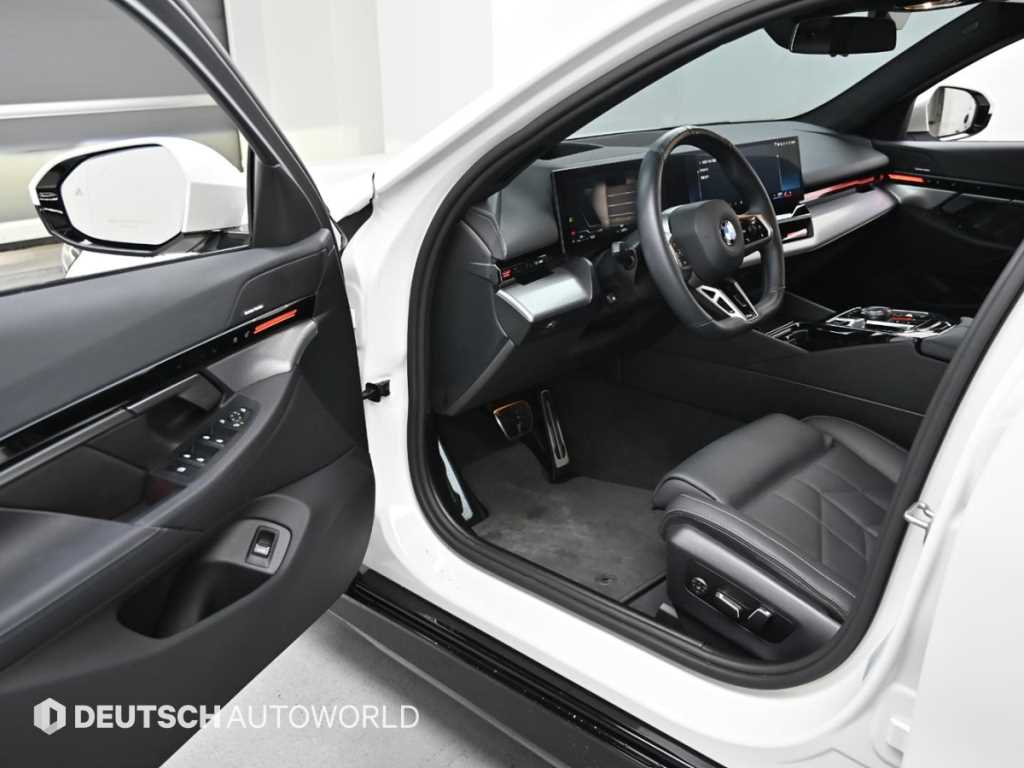BMW 5-Series — photo 11