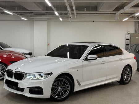 BMW 5-Series — photo 01