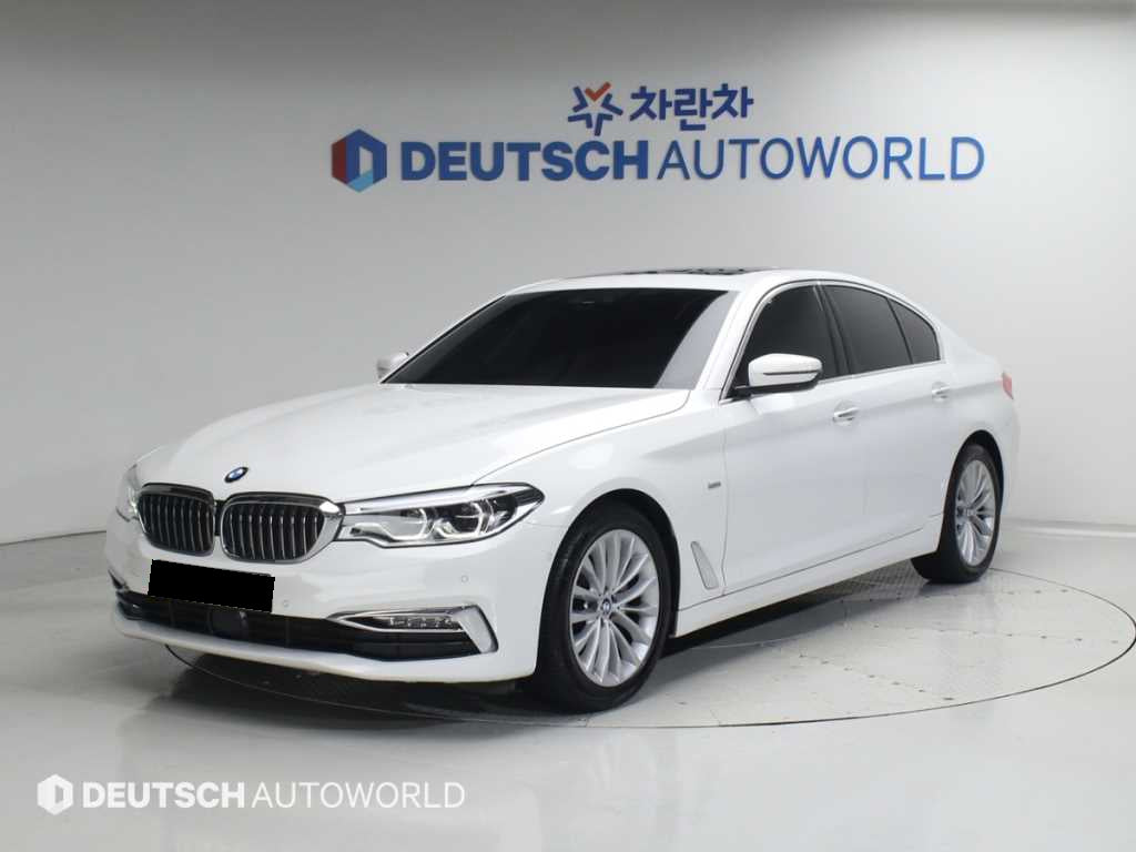 BMW 5-Series — photo 01