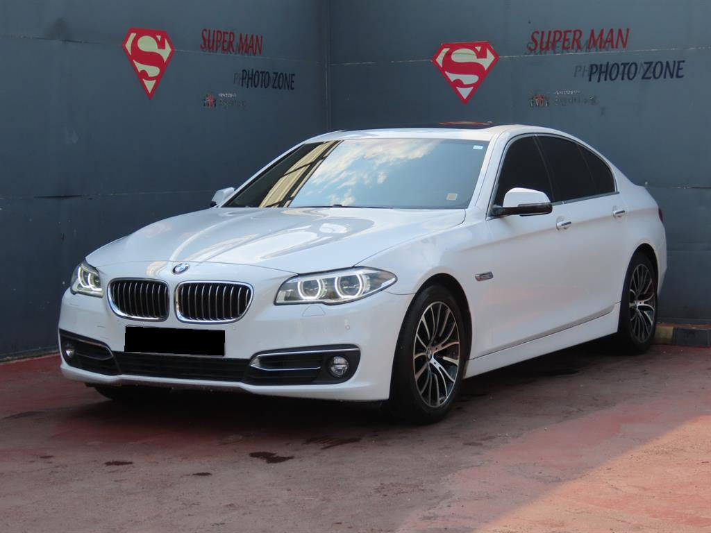 BMW 5-Series — photo 01