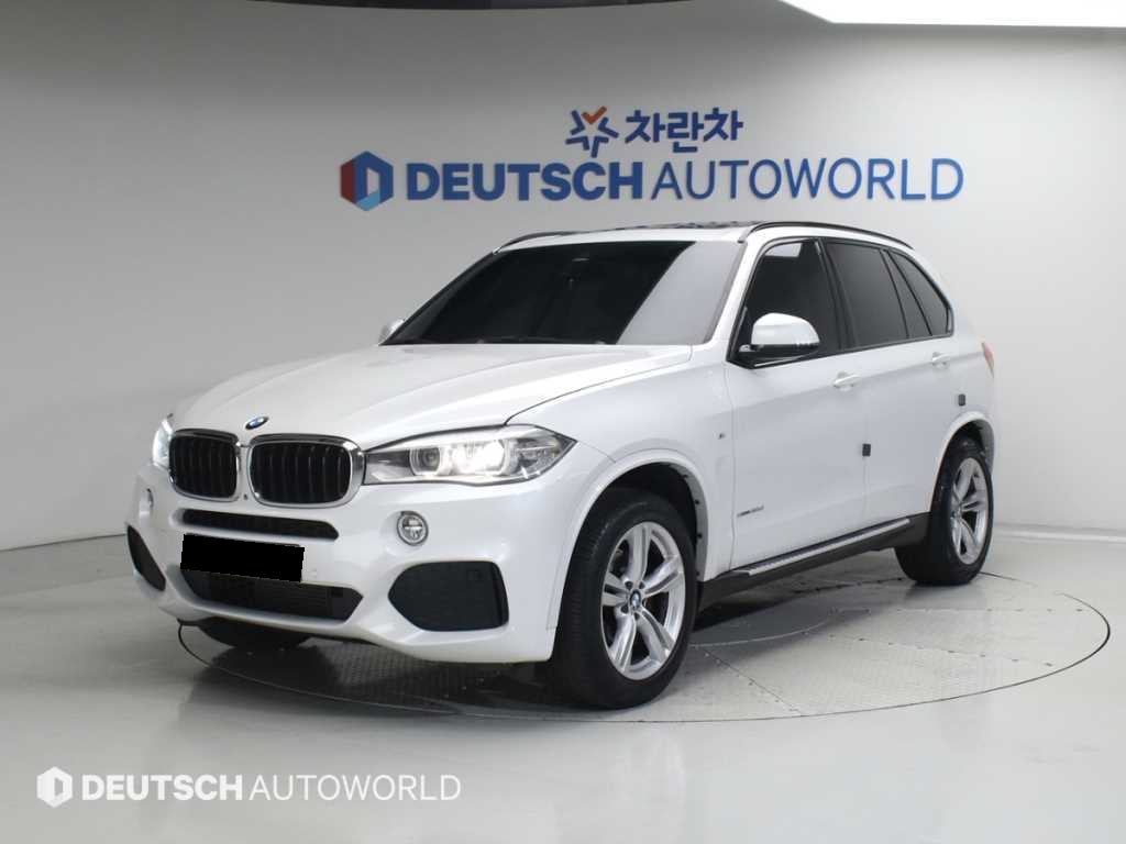 BMW X5 — photo 01