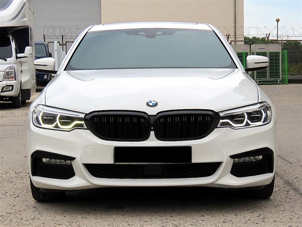 BMW 5-Series — photo 01