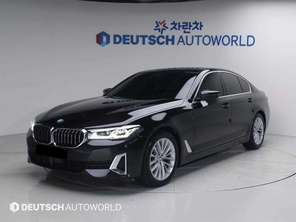 BMW 5-Series — photo 01