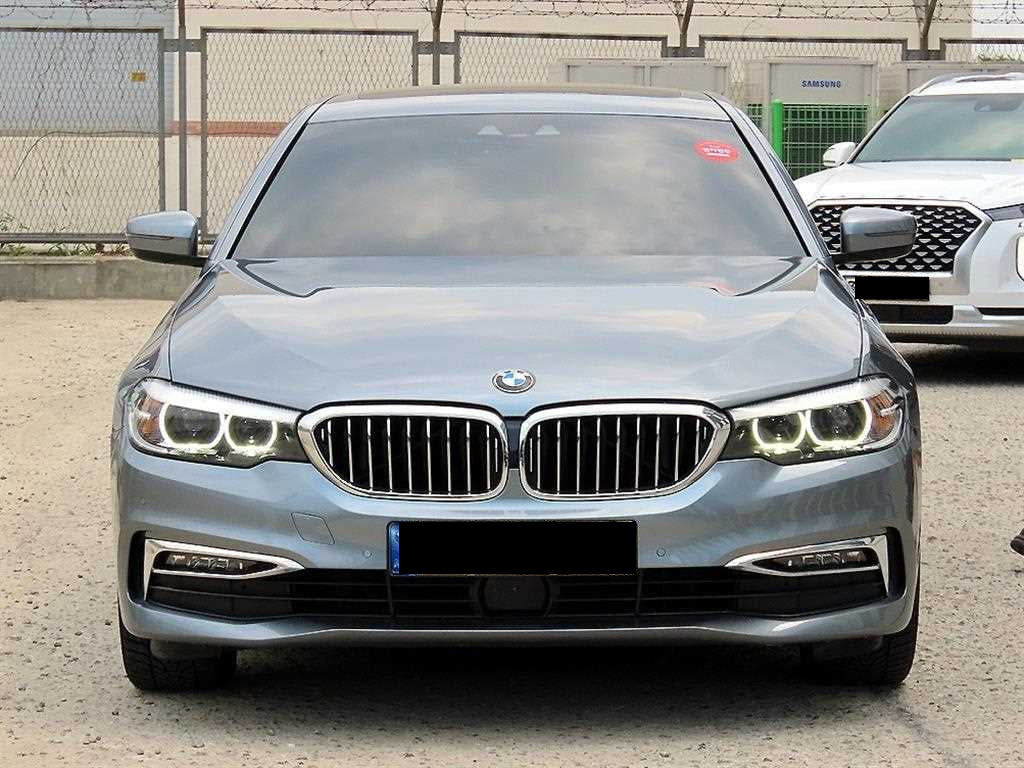 BMW 5-Series — photo 01