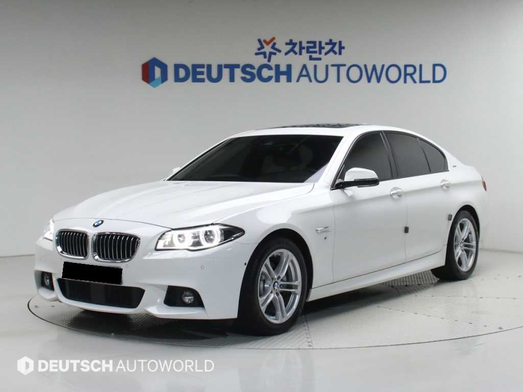 BMW 5-Series — photo 01