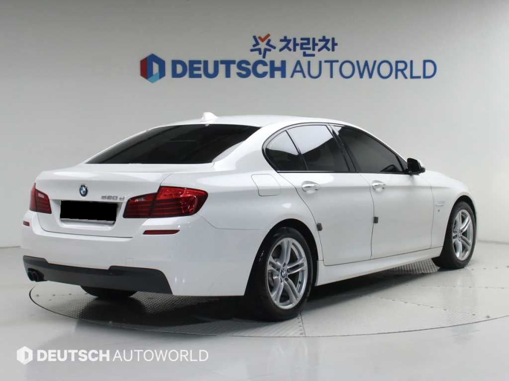 BMW 5-Series — photo 02