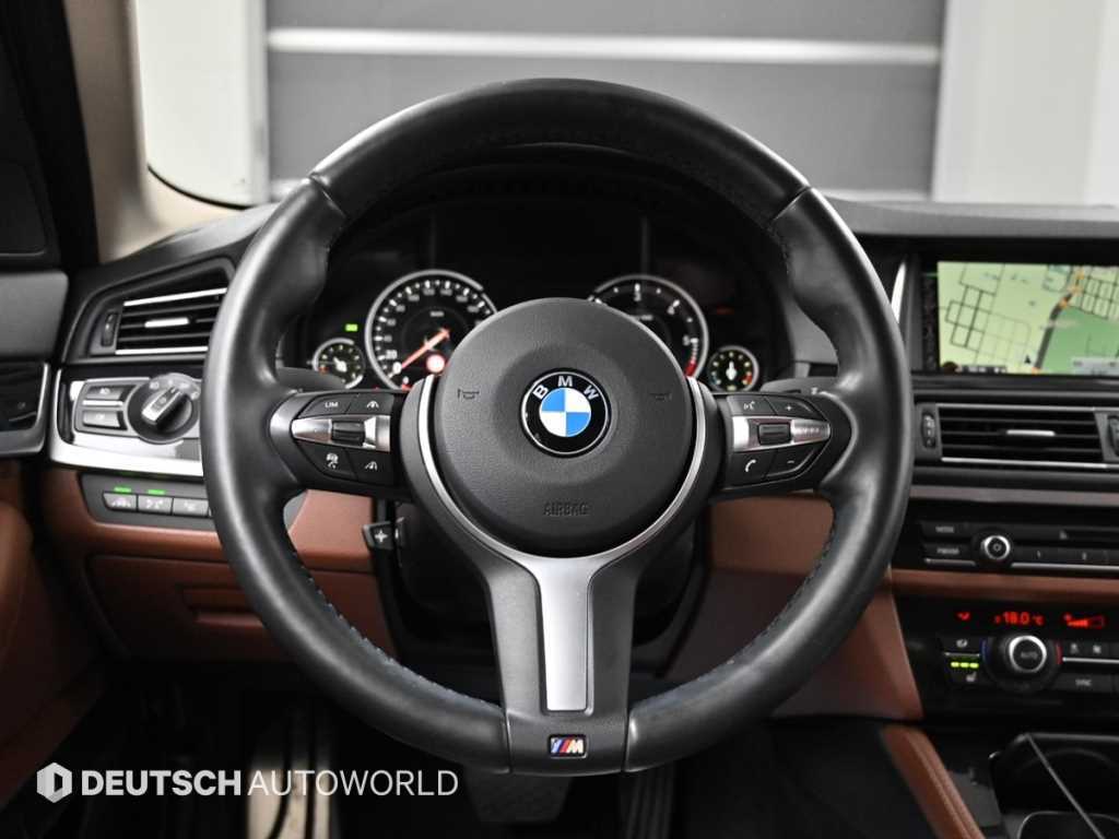 BMW 5-Series — photo 14