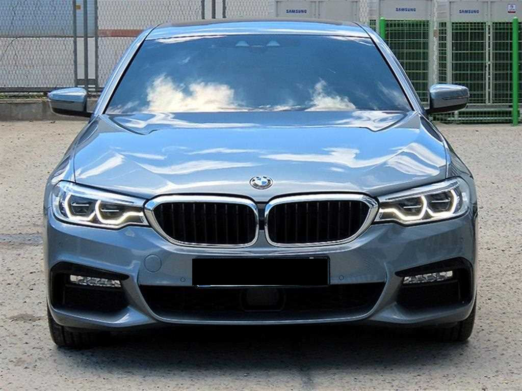 BMW 5-Series — photo 01