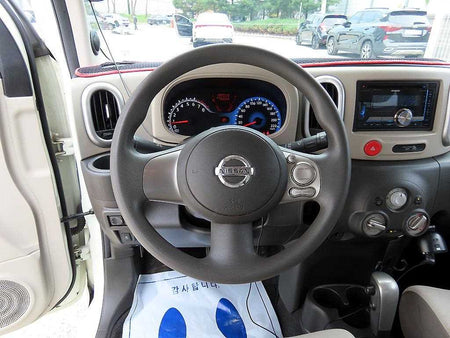 Nissan Cube — photo 08