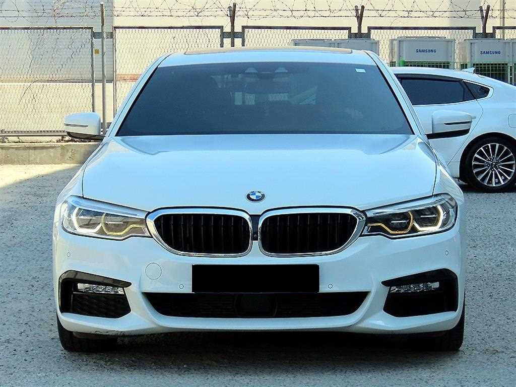 BMW 5-Series — photo 01