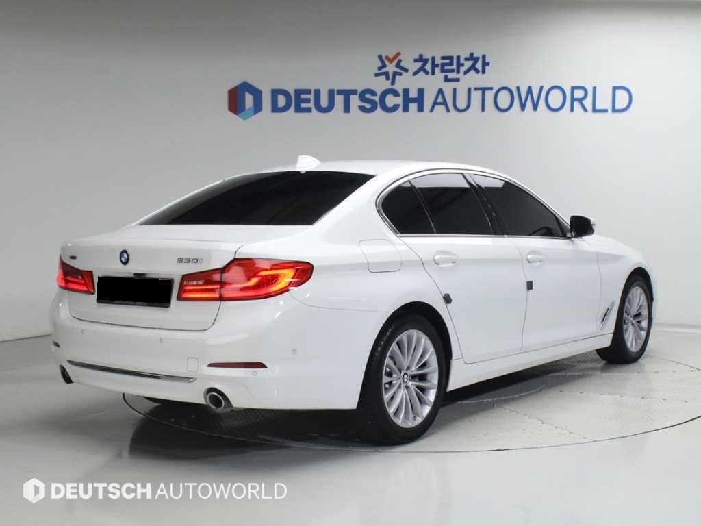 BMW 5-Series — photo 02