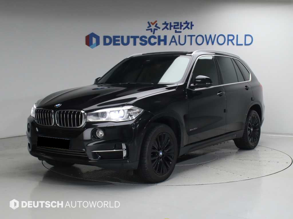 BMW X5 — photo 01