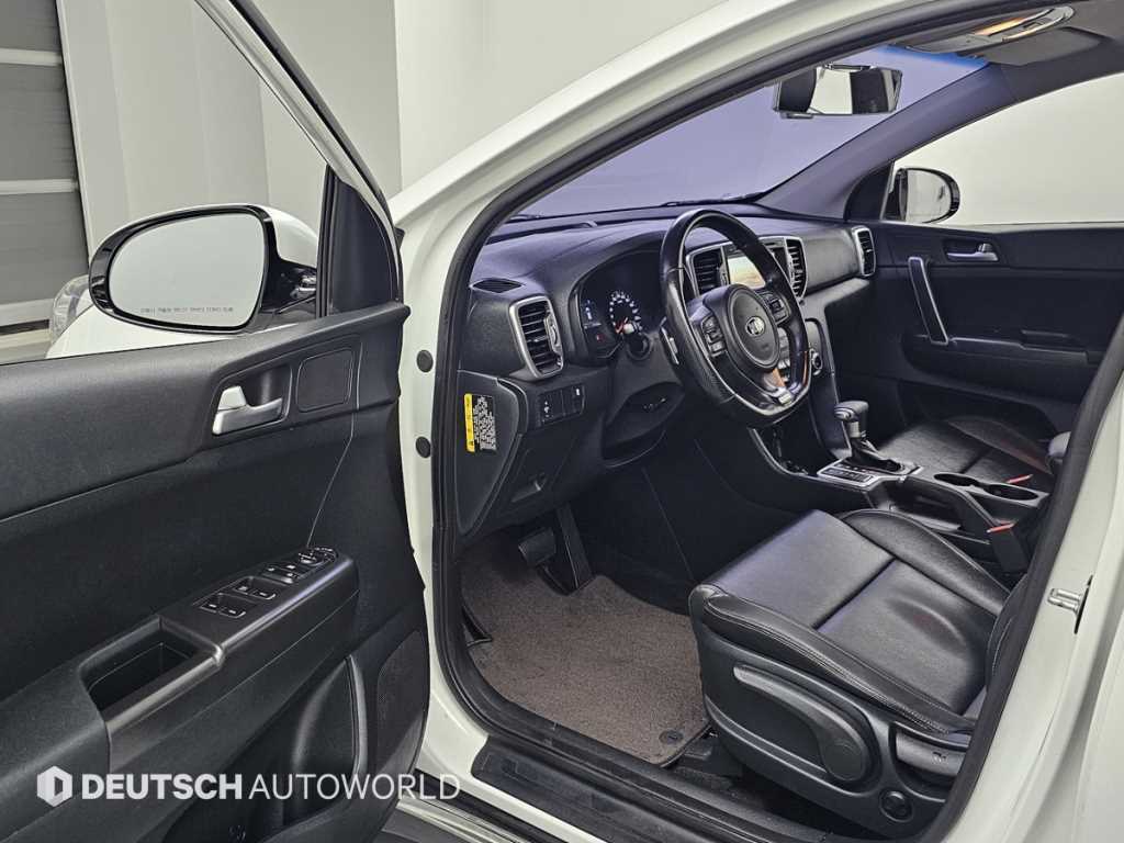 Kia Sportage — photo 11