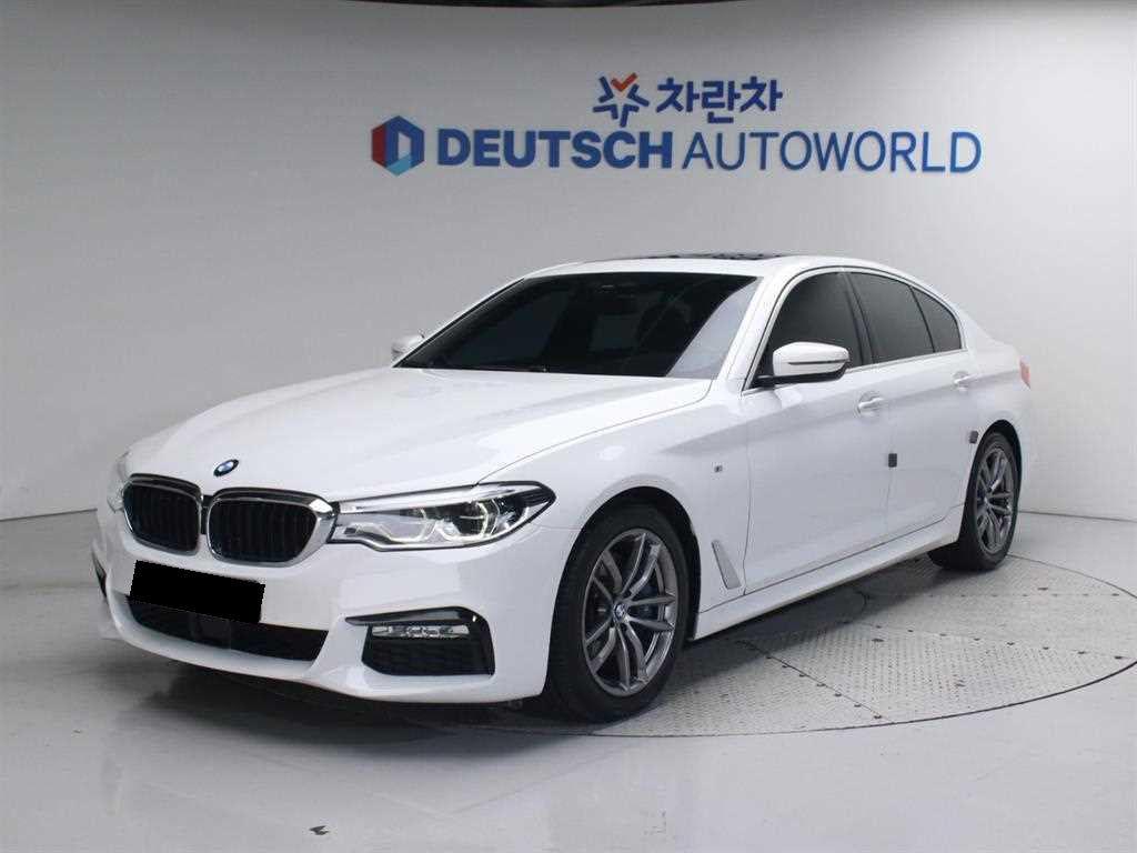 BMW 5-Series — photo 01