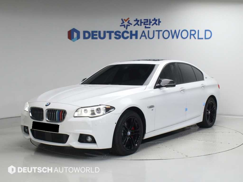 BMW 5-Series — photo 01