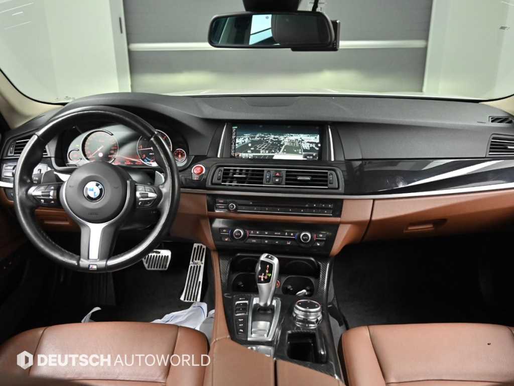 BMW 5-Series — photo 07