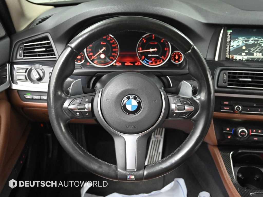 BMW 5-Series — photo 13