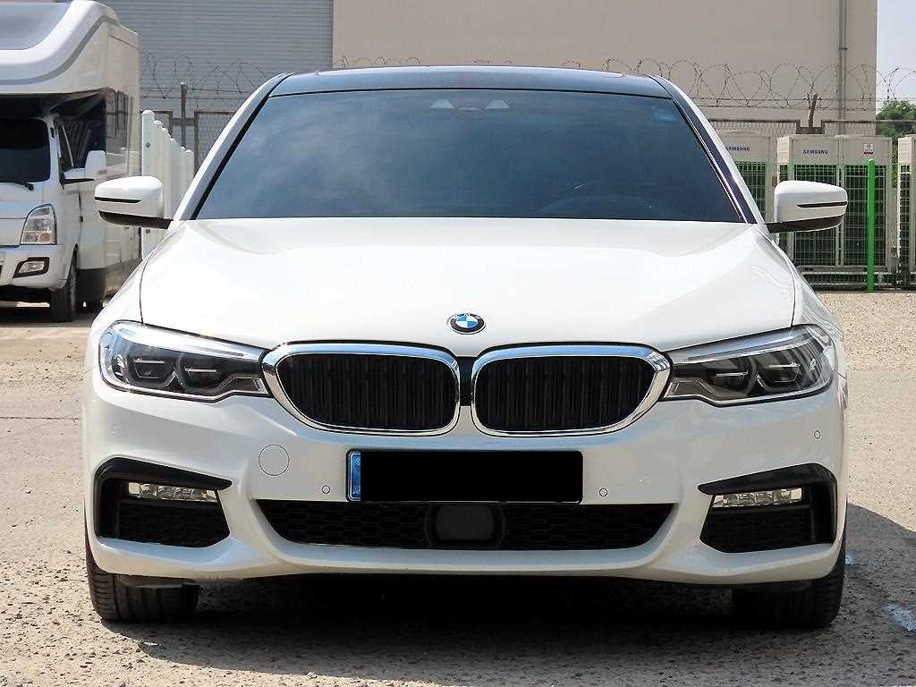 BMW 5-Series — photo 01