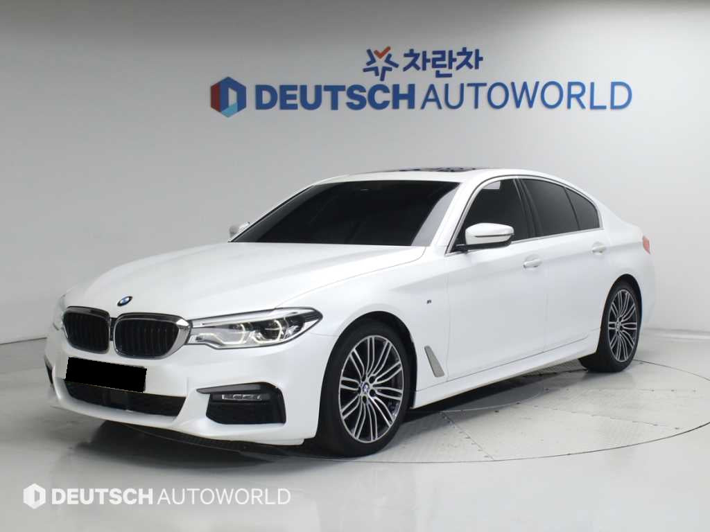 BMW 5-Series — photo 01