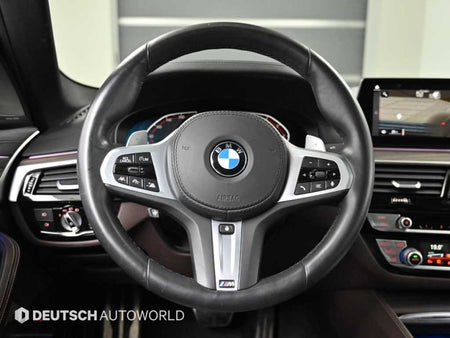 BMW 5-Series — photo 13