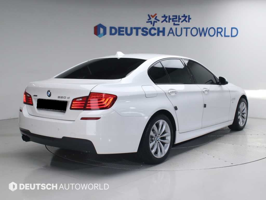 BMW 5-Series — photo 02