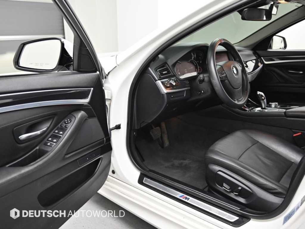 BMW 5-Series — photo 10
