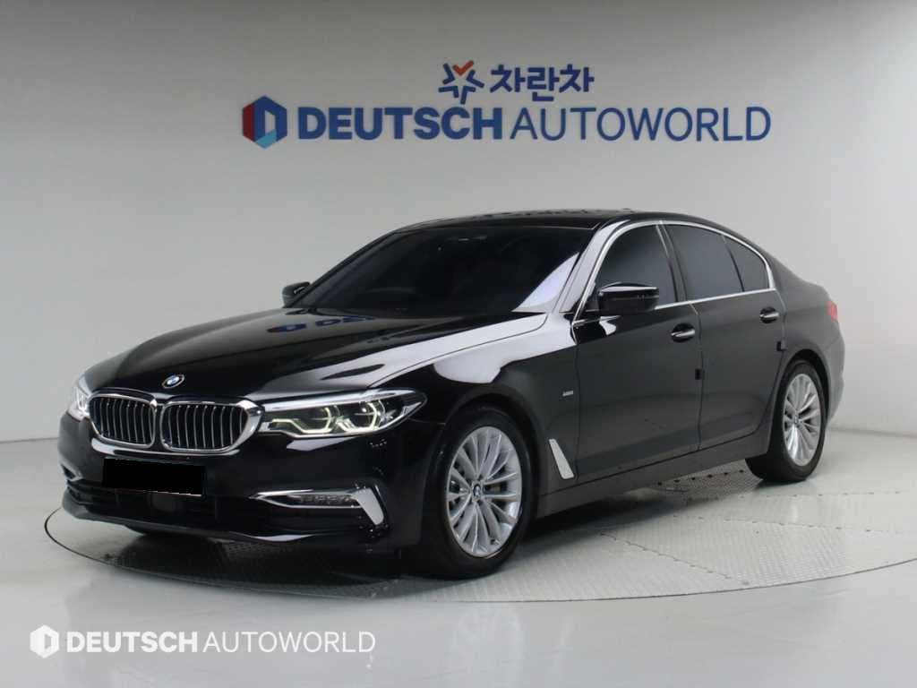 BMW 5-Series — photo 01