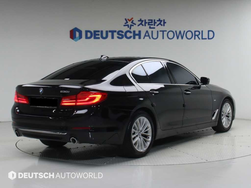 BMW 5-Series — photo 02