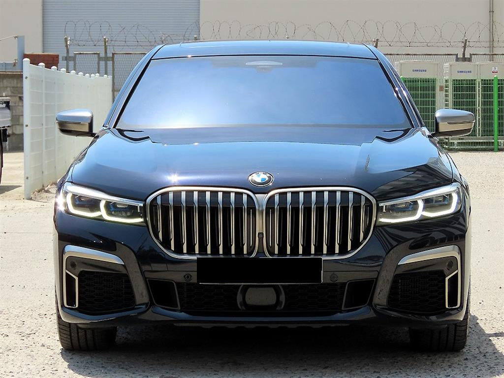 BMW 7-Series — photo 01