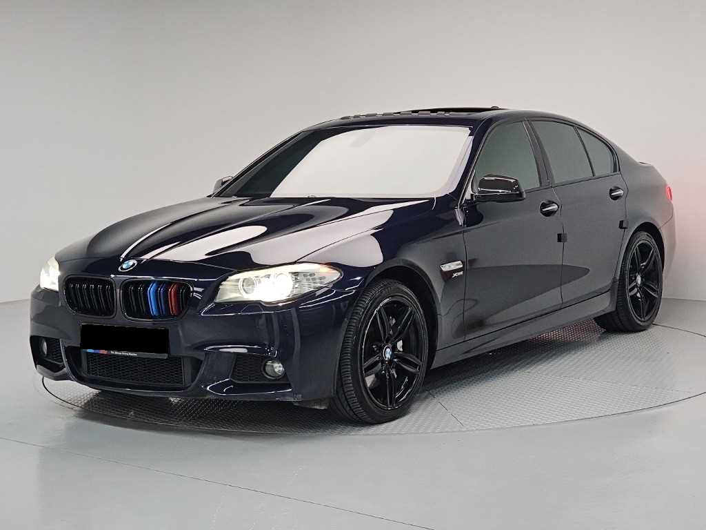 BMW 5-Series — photo 01