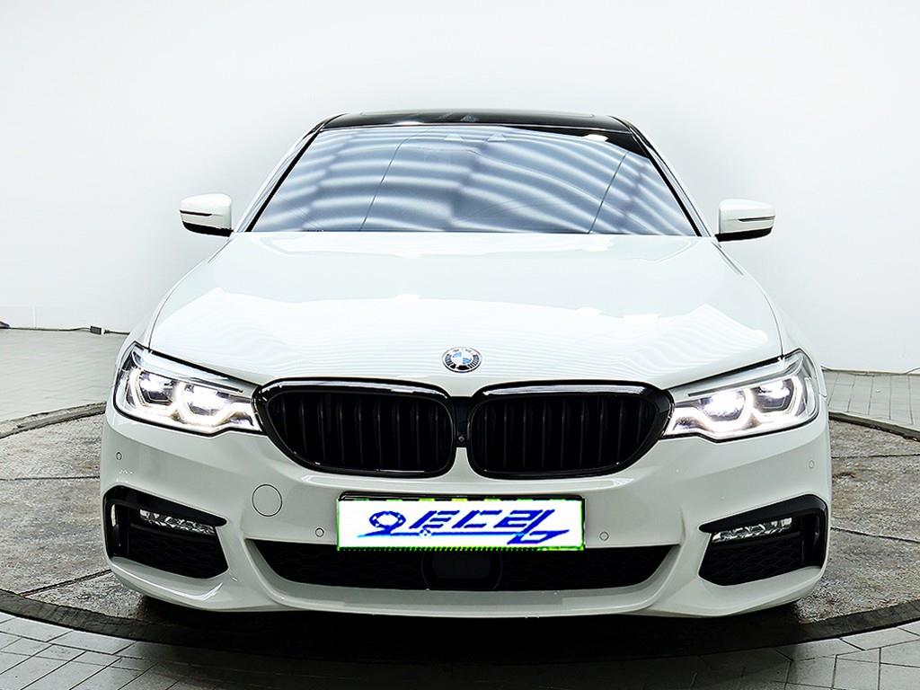 BMW 5-Series — photo 01