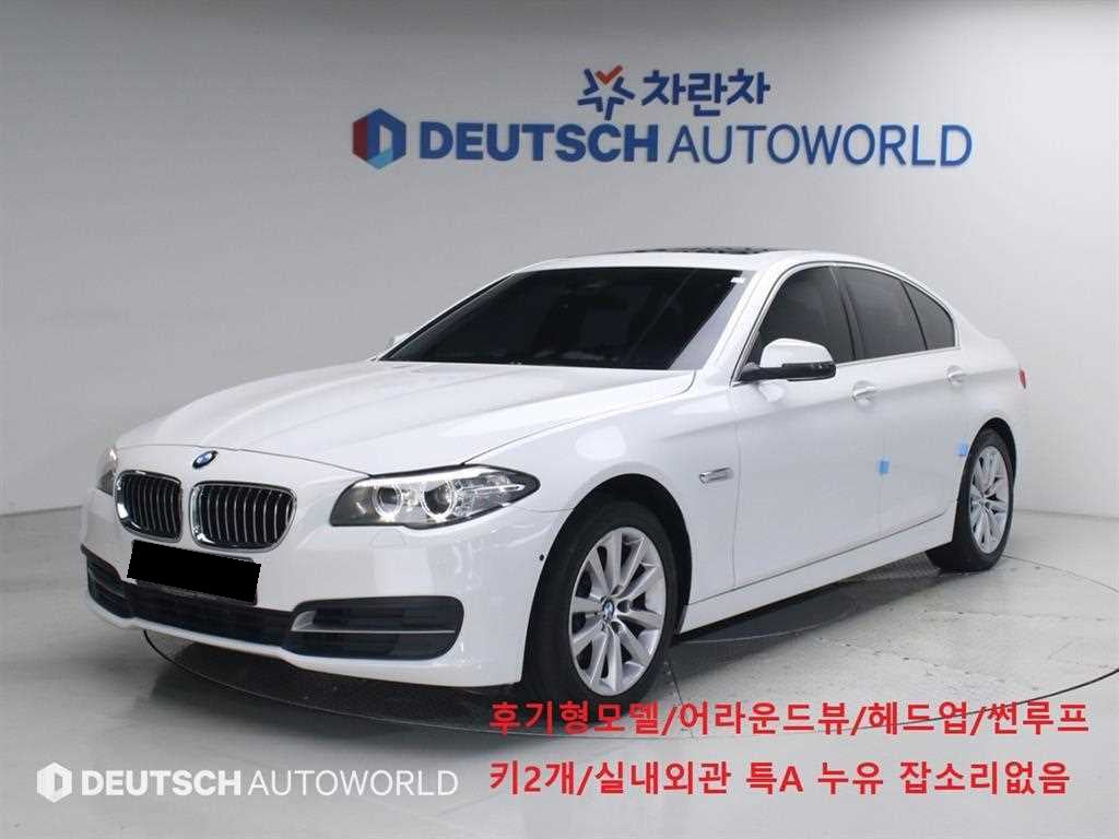 BMW 5-Series — photo 01