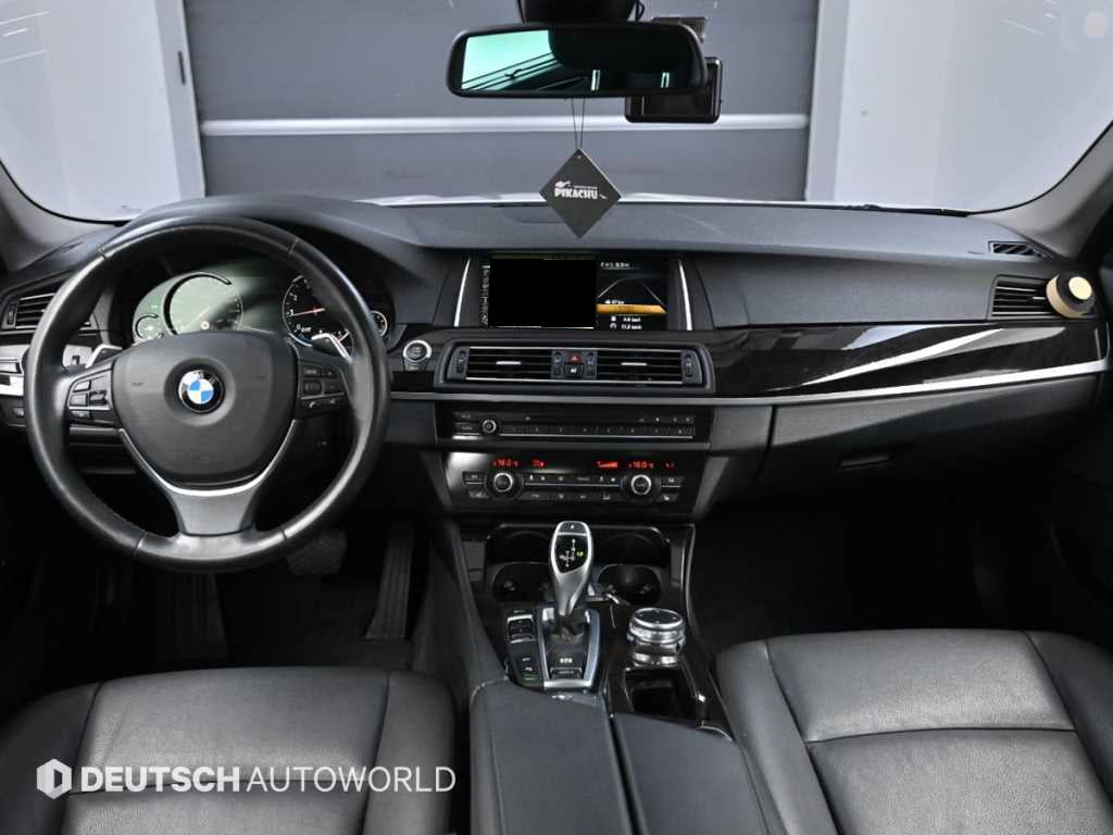 BMW 5-Series — photo 07