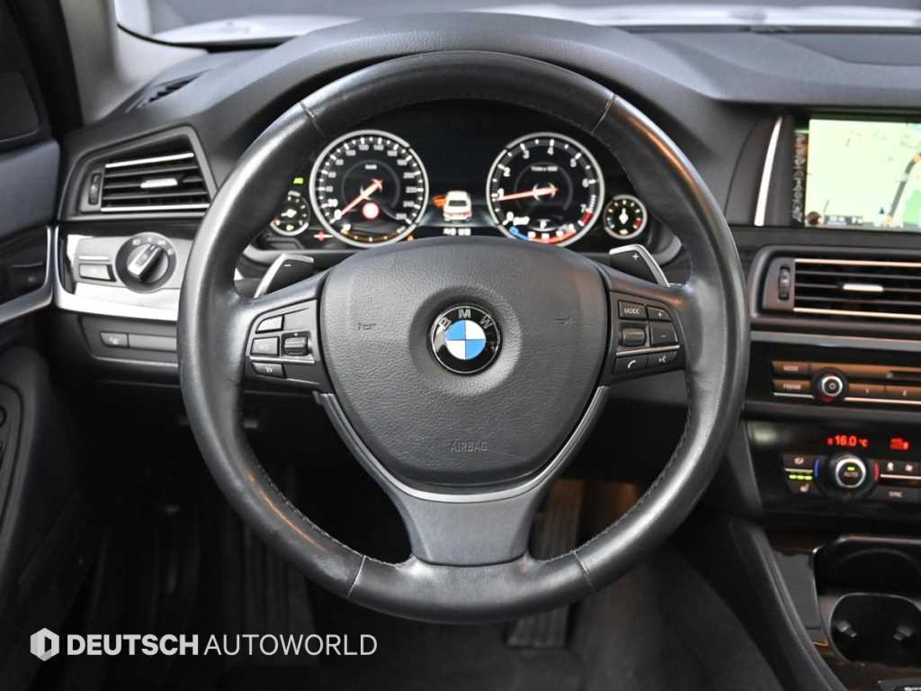 BMW 5-Series — photo 13