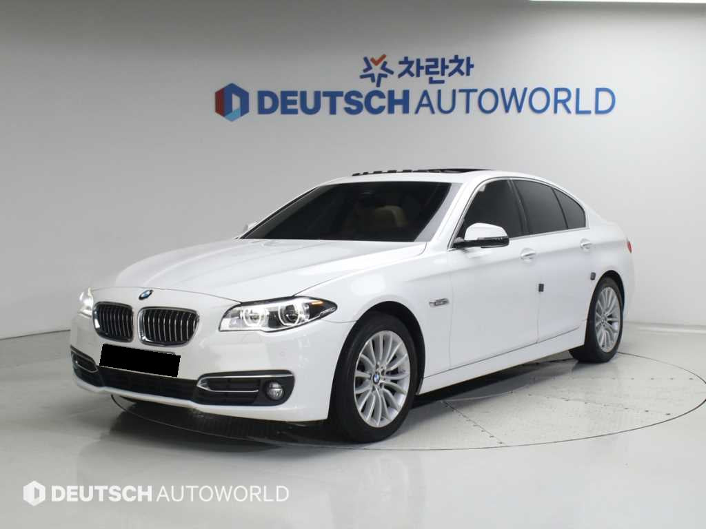 BMW 5-Series — photo 01