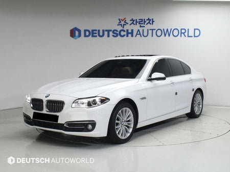 BMW 5-Series — photo 01