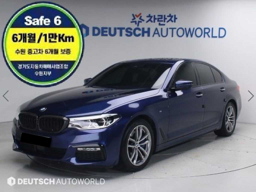 BMW 5-Series — photo 01