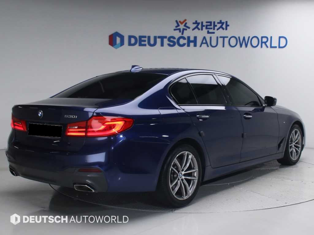 BMW 5-Series — photo 02