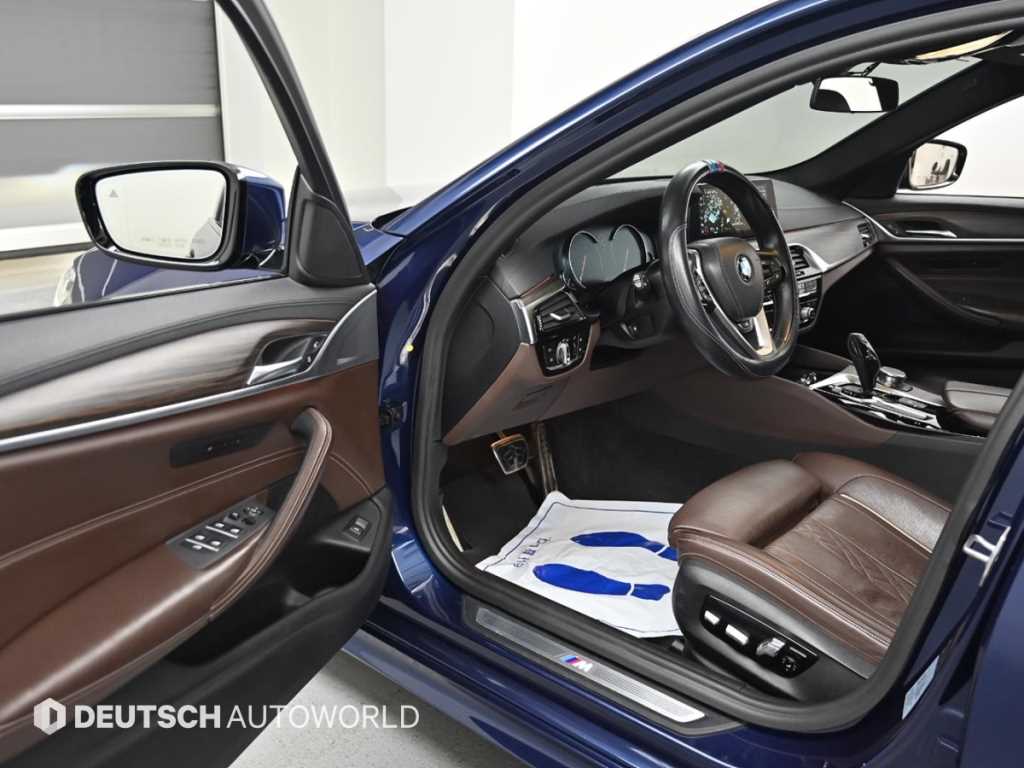 BMW 5-Series — photo 11