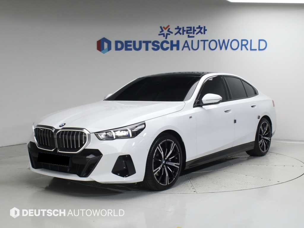 BMW 5-Series — photo 01