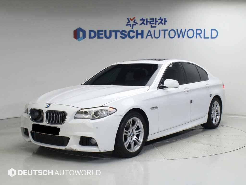 BMW 5-Series — photo 01