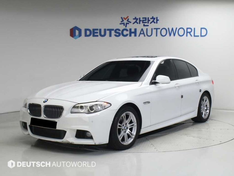 BMW 5-Series — photo 01