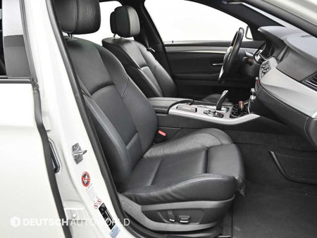 BMW 5-Series — photo 10