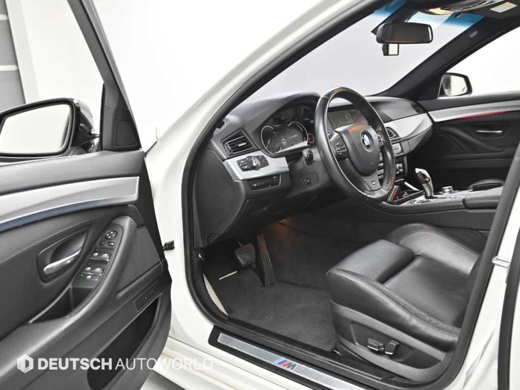 BMW 5-Series — photo 11
