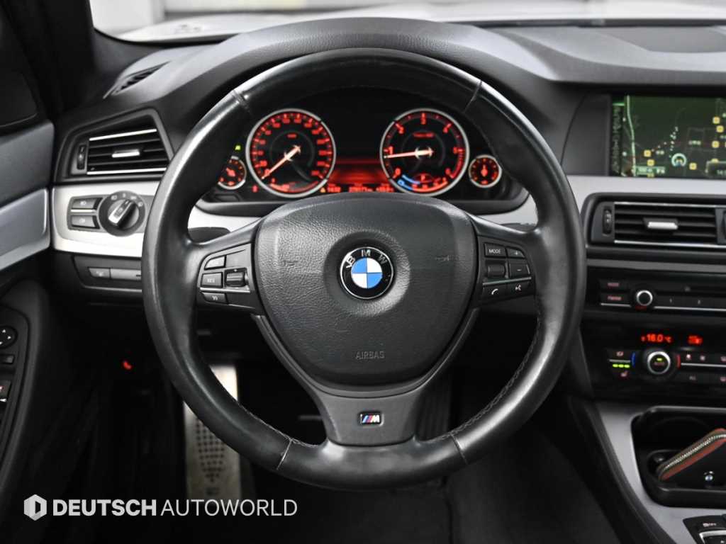 BMW 5-Series — photo 13
