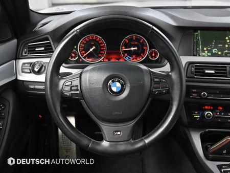 BMW 5-Series — photo 13