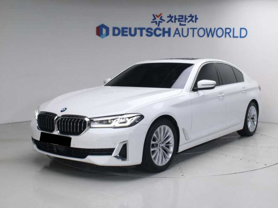 BMW 5-Series — photo 01