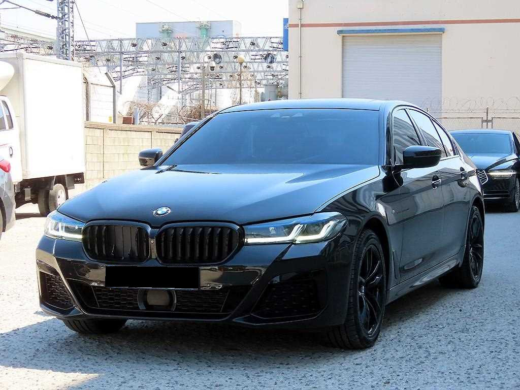BMW 5-Series — photo 02