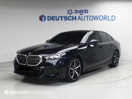 BMW 5-Series — photo 01